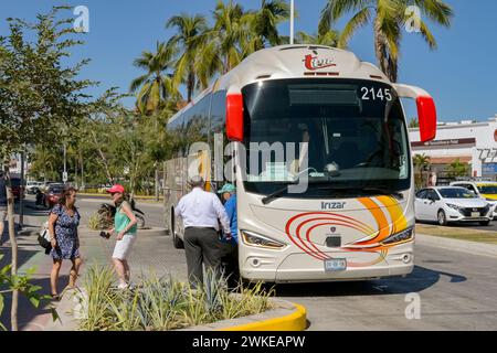 Puerto Vallarta, Mexico - 15 January 2024: Cruise ship passengers on an excursions getting off a tour bus Stock Photo