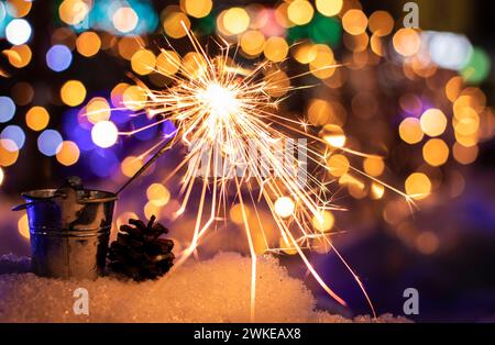 Flames of Bengal fire on the streets of the night city Stock Photo
