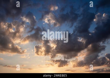 Cloudy sky with the sun at dawn early in the morning Stock Photo