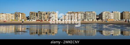 The reflections of de panne on its beach Stock Photo