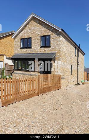 Alamy last of 42 images of building construction stages of work under way to detached house on infill plot from start to this finished view England UK Stock Photo