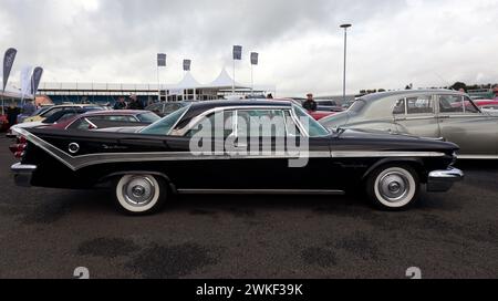 Side View of a Black, 1959, Desoto Fireflite Sportsmans  Coupe, on sale in the Iconic Auction, at the 2023 Silverstone Festival Stock Photo