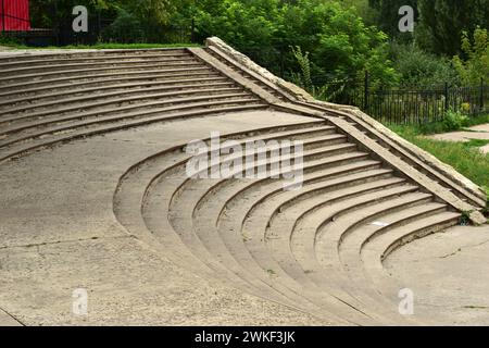 A semicircular staircase with numerous steps connects two levels in the Gordo park. Stock Photo