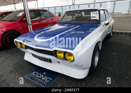 Three-Quarters Front View of a Rare, 1973, Ford Capri RS2600, a  barn-find in France, on sale in the Iconic Auction, at the 2023 Silverstone Festival Stock Photo