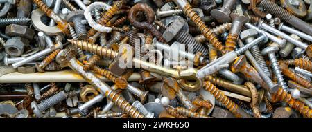 Panorama Old Rusty Bolts and Nuts, Texture Background Stock Photo