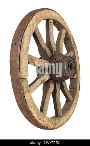 Old rustic wooden wagon wheel isolated on white background, perspective view from behind Stock Photo