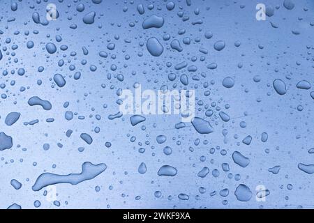 abstract background of raindrops on metal seat surface Stock Photo