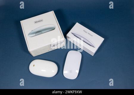 white Apple magic mouse wireless apple mighty mouse bluetooth and boxes packaging Stock Photo