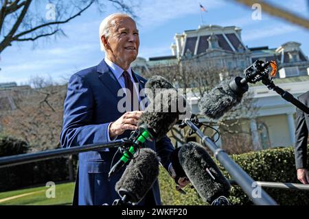 United States President Joe Biden talks to members of the press before boarding Marine One on the South Lawn of the White House on February 20, 2024 in Washington, DC The President is traveling to California where he will visit Los Angeles, San Francisco, and Los Altos Hills. Credit: Samuel Corum/Pool via CNP Stock Photo