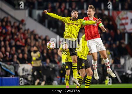 Eindhoven, Netherlands. 20th Feb, 2024. EINDHOVEN, NETHERLANDS - FEBRUARY 20: Emre Can of Borussia Dortmund heads the ball with Luuk de Jong of PSV during the UEFA Champions League First Leg match between PSV and Borussia Dortmund at Philips Stadion on February 20, 2024 in Eindhoven, Netherlands. (Photo by Broer van den Boom/Orange Pictures) Credit: Orange Pics BV/Alamy Live News Stock Photo