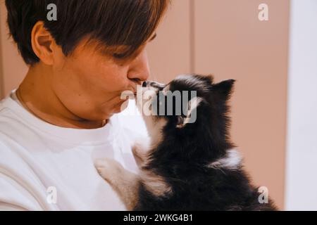 PUPPY YOGA IN PARIS Stock Photo