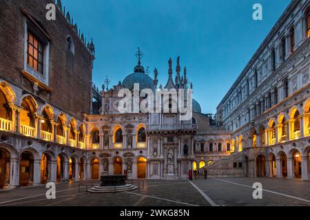 Venice, Italy - February 6, 2024: Courtyard of the Doge's Palace (Palazzo Ducale) in Venice. San Marco basilica in background Stock Photo
