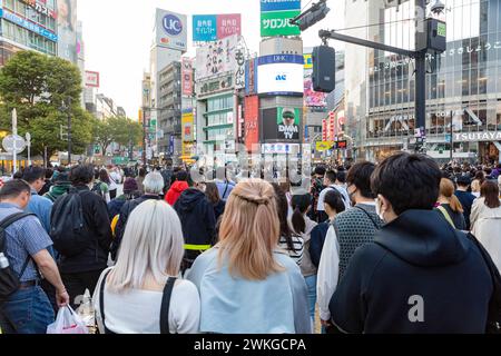 Shibuya city, world famous Shibuya scramble crossing, pelican crossing, early evening, crowds on the street,Tokyo,Japan,Asia,2023 Stock Photo