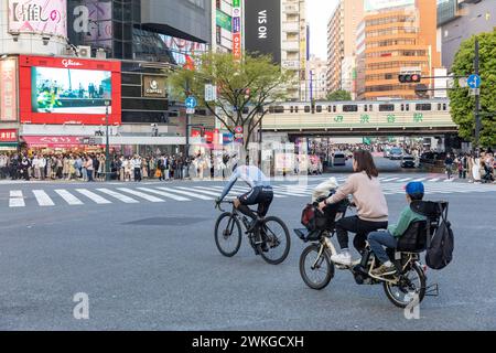 Shibuya city, world famous Shibuya scramble crossing, pelican crossing, early evening, crowds on the street,Tokyo,Japan,Asia,2023 Stock Photo