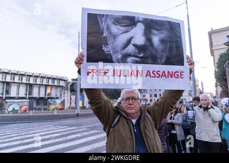 Rome, Italy. 20th Feb, 2024. People shows a banner for Julian Assange during sit-in in Rome in front of the British Embassy (Photo by Matteo Nardone/Pacific Press) Credit: Pacific Press Media Production Corp./Alamy Live News Stock Photo