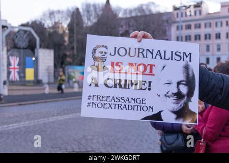 Rome, Italy. 20th Feb, 2024. People shows a banner for Julian Assange during sit-in in Rome in front of the British Embassy (Photo by Matteo Nardone/Pacific Press) Credit: Pacific Press Media Production Corp./Alamy Live News Stock Photo