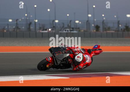 Doha, Qatar. 20th Feb, 2024. Ducati Lenovo's Italian rider Francesco Bagnaia steers his bike on the second day of the MotoGP pre-season testing at the Lusail International Circuit in Lusail, Doha, Qatar, Feb. 20, 2024. Credit: Qian Jun/Xinhua/Alamy Live News Stock Photo