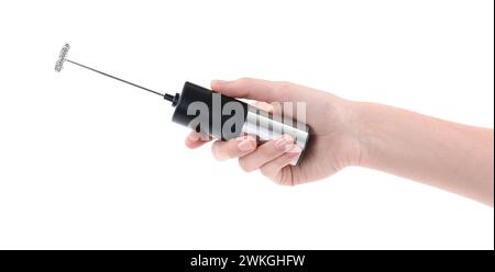 Woman holding milk frother wand on white background, closeup Stock Photo