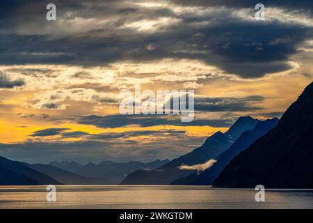 Sunset behind the mountains of the Avenue of Glaciers, Patagonia, Chile Stock Photo