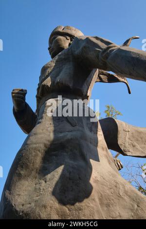 A side view of the statue of Aliya Moldagulova. At the sculpture memorial to WWII, Great Patriotic War Kazakh fighters, Aliya Moldagulova and Manshuk Stock Photo