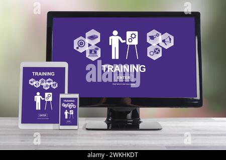 Training concept shown on different information technology devices Stock Photo
