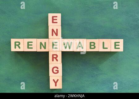 Renewable energy problem solving, solution and strategy concept. Crossword flat lay composition in green background. Stock Photo