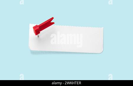 Blank note and red thumbtack on a light blue background with copy space Stock Photo