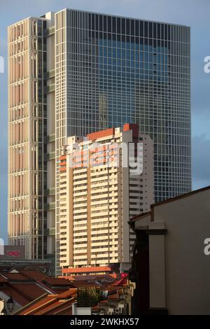 Vertical perspective view of contemporary architecture skyscraper of Singapore State Court facing the sunset direction before the evening timing. Stock Photo