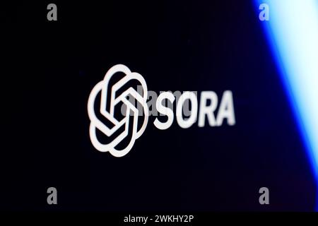Sora OpenAI logo on black screen. New text to video AI mode; Stock Photo