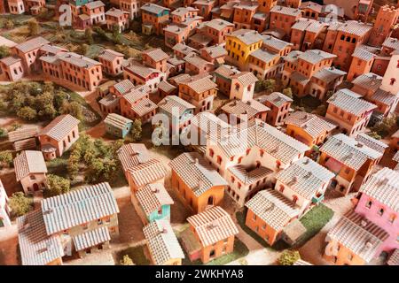 Diorama, miniature houses of medieval plan of San Gimignano, Tuscany, Italy. Close up, macro shot with small houses, roofs and brick walls details Stock Photo