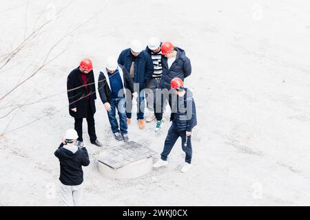 Workers checking quality at construction site Stock Photo