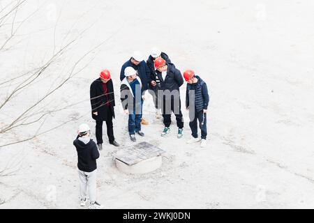 Workers checking quality at construction site Stock Photo