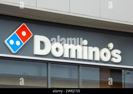 Signage for the fast food outlet, Domino's , Ayr, UK Stock Photo