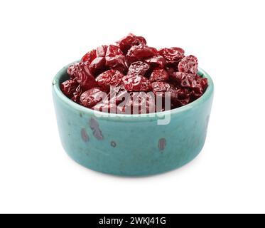 Dried cranberries in bowl isolated on white Stock Photo