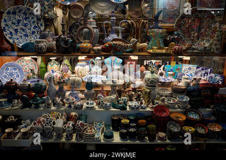 ISTANBUL, TURKEY - JANUARY 6 2024 bazaar in Istanbul. People shopping and walking throught the famous ancient bazaar with fake fashion, jewels, spice Stock Photo