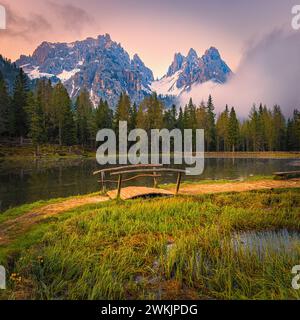 A square 1:1 photo from a sunrise at Lake Antorno (Lago d'Antorno), a small mountain lake in the Italian Dolomites. It is located in the north of the Stock Photo