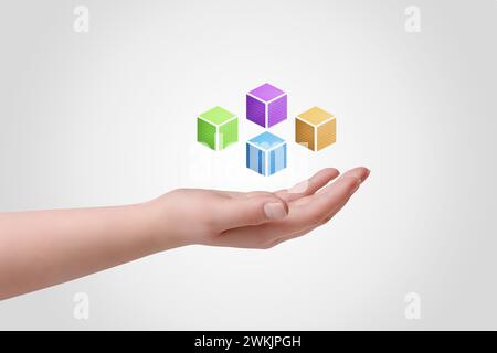 Hand holding levitating blockchain cubes with binary code, symbolizing digital empowerment and innovation. Ideal for technology and finance concepts Stock Photo
