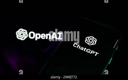 ChatGPT and OpenAI logo on screens Stock Photo