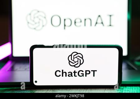 ChatGPT and OpenAI logo on screens Stock Photo