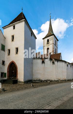 The fortified Church of Saint Arbogast at municipality of Muttenz. Canton of  Basel-Land, Switzerland. The church is the only one in Switzerland  that Stock Photo