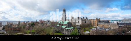 Glasgow Scotland: 12th Feb 2024: Glasgow city skyline panorama with cathedral view from Necropolis. Glasgow Cathedral undergoing restoration Stock Photo