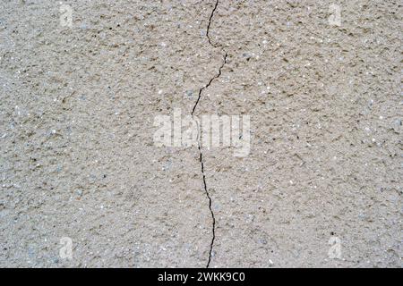 Crack in a cement wall, structural damage Stock Photo