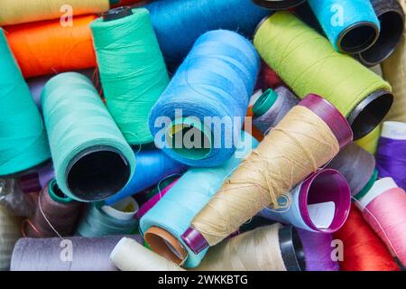 Colorful Thread Spools in Disarray Close-Up Stock Photo