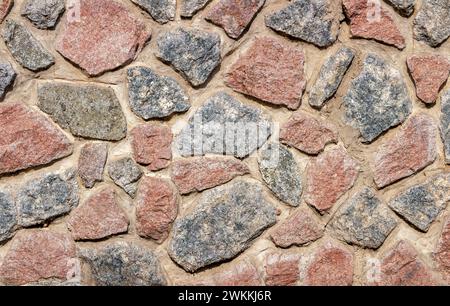 Gray stone wall background. Masonry texture. Stock Photo