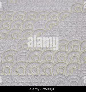 Textured Grey and Lime Green Embroidered Fabric Close-Up Stock Photo