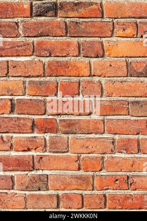 Texture of old vintage red brick wall. Close up. Stock Photo
