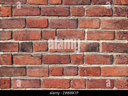 Texture of old vintage red brick wall. Close up. Stock Photo