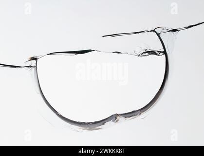 Cracked glass texture on white background. Stock Photo