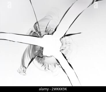 Texture of broken glass, macro photo on white background. Stock Photo