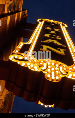 Vibrant Theater Marquee Lights at Night, Low Angle View Stock Photo